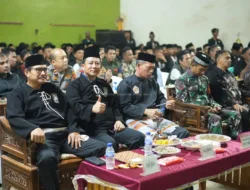 Bupati Muaro Jambi Hadiri Malam Pengesahan Warga Baru PSHT 2025 di Desa Mingkung Jaya