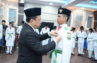 Prosesi pengukuhan dipimpin langsung oleh Bupati Muaro Jambi, Dr. Bambang Bayu Suseno, S.P., M.M., M.Si.