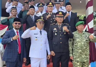 Anggota DPRD Kabupaten Muaro Jambi dari Fraksi PAN, Robinson Sirait, S.M., menghadiri upacara peringatan detik-detik Proklamasi dalam rangka Hari Ulang Tahun (HUT) ke-81 Republik Indonesia di Kecamatan Sungai Bahar