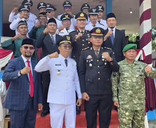 Anggota DPRD Kabupaten Muaro Jambi dari Fraksi PAN, Robinson Sirait, S.M., menghadiri upacara peringatan detik-detik Proklamasi dalam rangka Hari Ulang Tahun (HUT) ke-81 Republik Indonesia di Kecamatan Sungai Bahar
